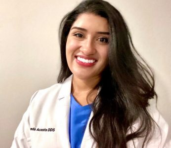 A headshot of Dr. Brenda Acosta smiling